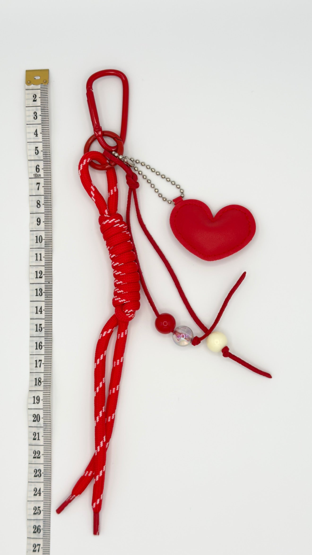 Ciondolo/portachiavi per decorare la borsa