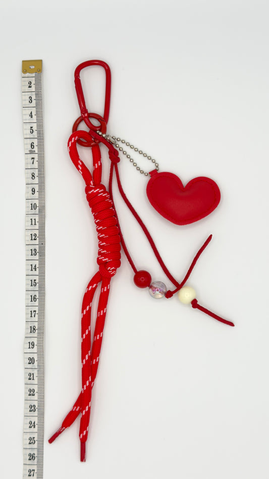 Ciondolo/portachiavi per decorare la borsa