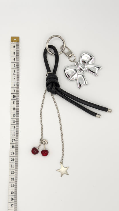 Ciondolo/portachiavi per decorare la borsa