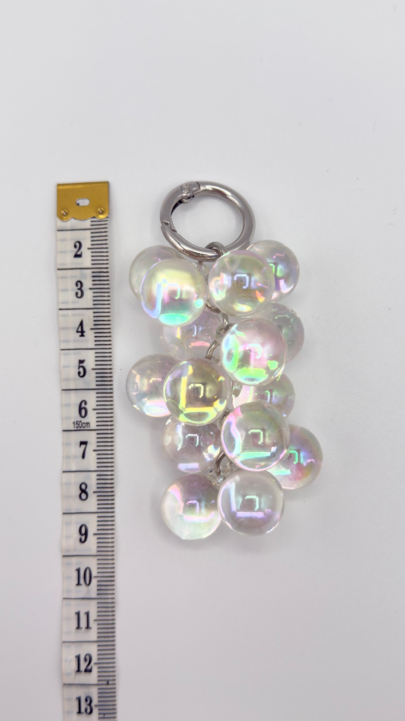 Ciondolo/portachiavi per decorare la borsa